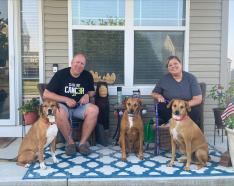 RyAnne Elsesser with her husband, Dave, and their dogs Toby, Blue and Penny.